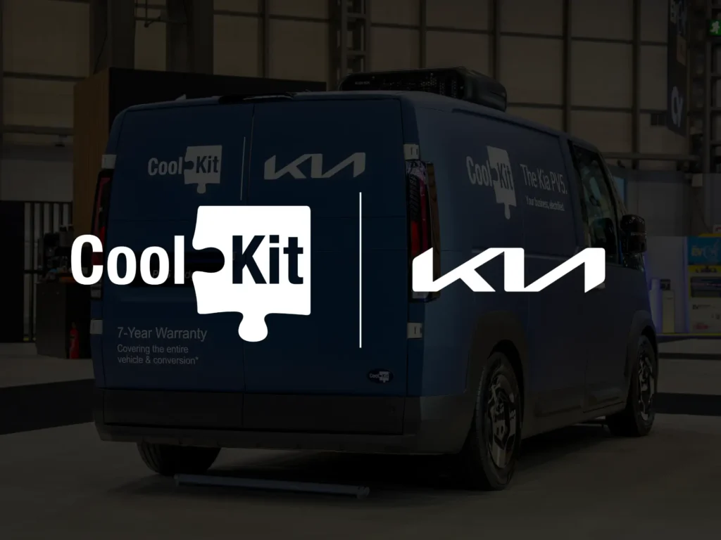 CoolKit and Kia partnership branding displayed over Kia PV5 electric refrigerated van at exhibition stand.